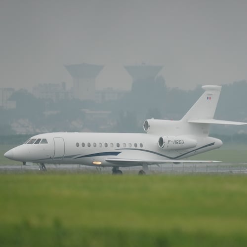 A plane carrying patients evacuated from the MV Hondius cruise ship with suspected hantavirus infection, lands at the Bourget airport, north of Paris, Sunday, May 10, 2026. (AP Photo/Thibault Camus)