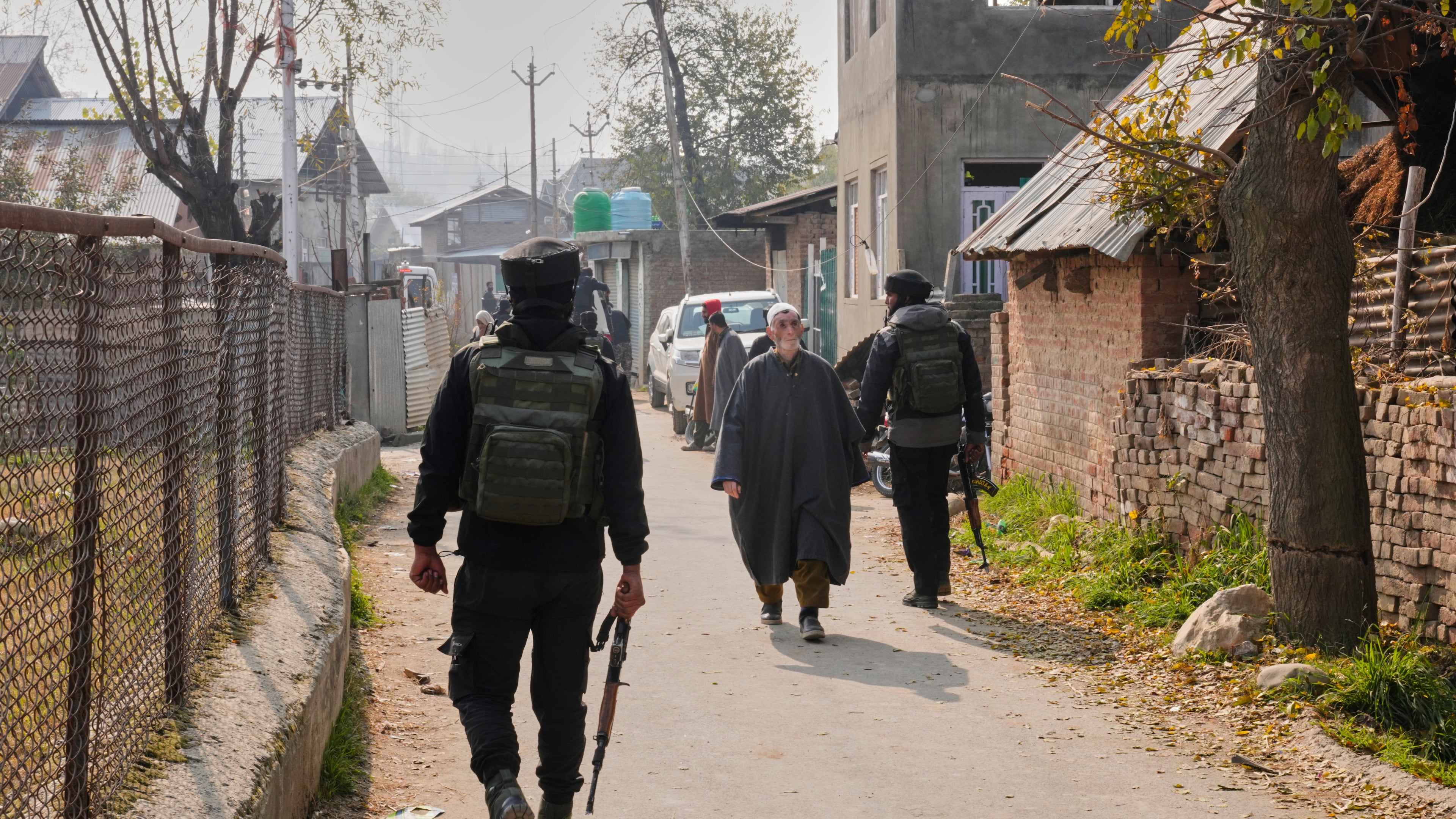 FILE - Indian army soldiers patrol outside near the blown-up home of one of the key suspect behind the Nov. 10 Delhi car blast, in Pulwama, south of Srinagar, Indian controlled Kashmir, on Nov. 14, 2025. (AP Photo/Dar Yasin, File)