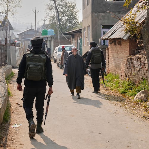FILE - Indian army soldiers patrol outside near the blown-up home of one of the key suspect behind the Nov. 10 Delhi car blast, in Pulwama, south of Srinagar, Indian controlled Kashmir, on Nov. 14, 2025. (AP Photo/Dar Yasin, File)