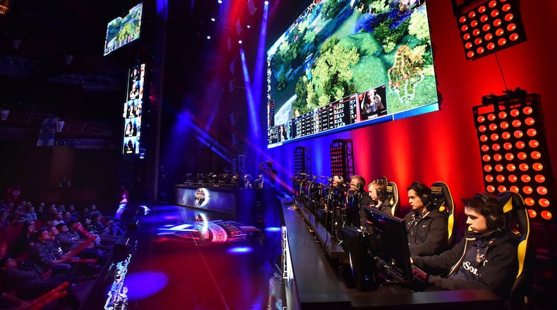 Teams compete during an opening day of SMITE World Championship 2016 last winter at the Cobb Energy Performing Arts Centre. HYOSUB SHIN / HSHIN@AJC.COM