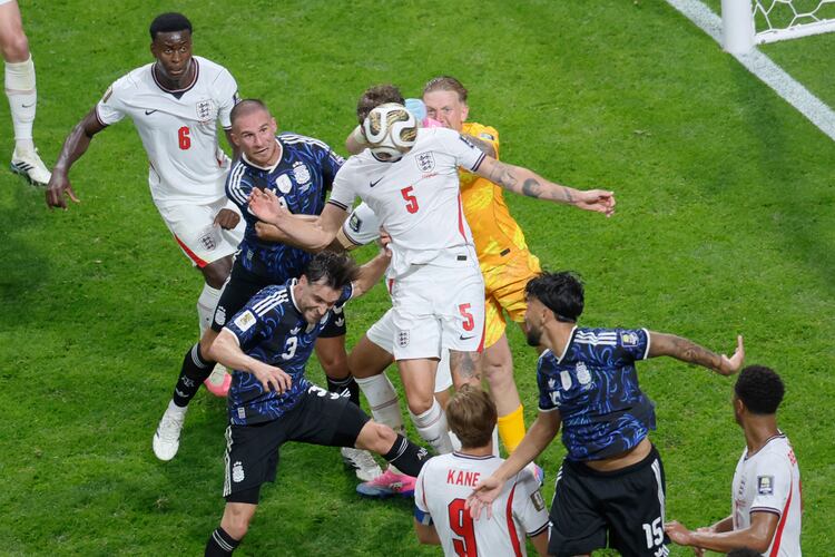 England defender John Stones, (5), heads the ball away from goal during second half of Argentina vs. England FIFA World Cup Semifinal match at Atlanta Stadium (Mercedes-Benz Stadium) on Wednesday, July 15, 2026. (Miguel Martinez/AJC)