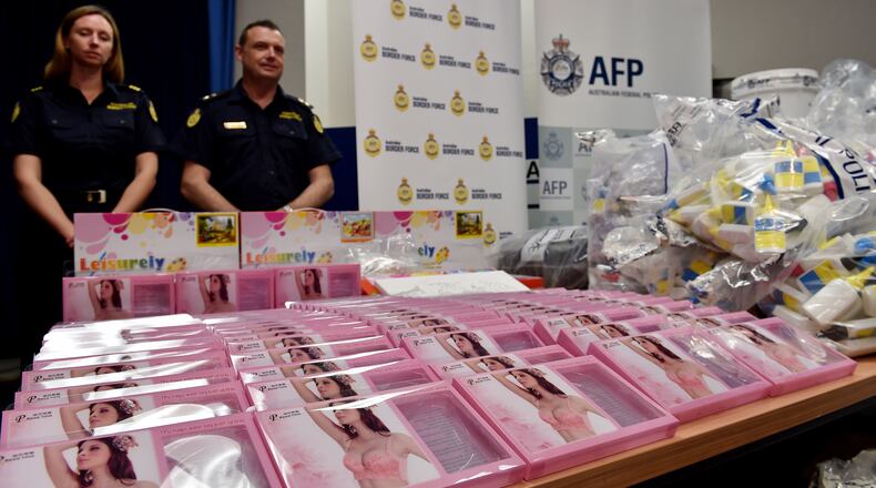 Gel bra inserts (foreground L) containing concealed crystal methamphetamine is seen at the Australian Federal Police headquarters in Sydney on February 15, 2016. Australian police have seized more than 712 million USD in crystal methamphetamine, or ice, some concealed in gel bra inserts in one of the country's biggest drug busts. AFP PHOTO / Saeed KHAN / AFP / SAEED KHAN (Photo credit should read SAEED KHAN/AFP/Getty Images)