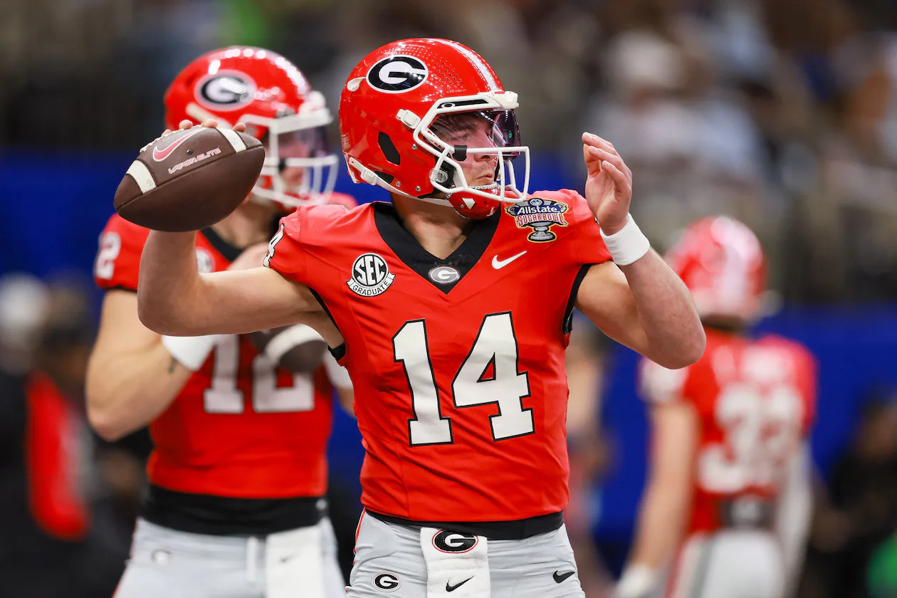 Georgia Bulldogs quarterback Gunner Stockton warms up before the NCAA College Football Playoff quarterfinal game against Ole Miss at the Sugar Bowl in the Caesars Superdome, Thursday, Jan. 1, 2026, in New Orleans. (Jason Getz/AJC)
