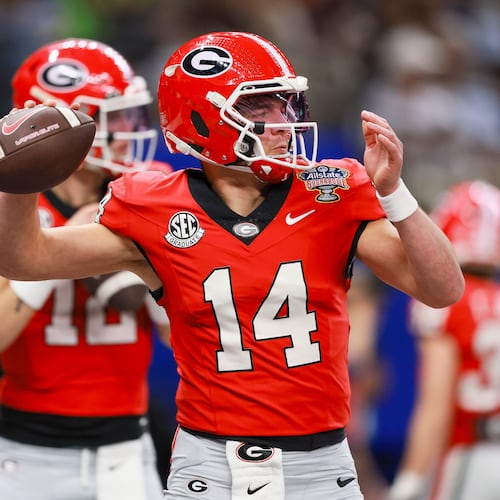 Georgia Bulldogs quarterback Gunner Stockton warms up before the NCAA College Football Playoff quarterfinal game against Ole Miss at the Sugar Bowl in the Caesars Superdome, Thursday, Jan. 1, 2026, in New Orleans. (Jason Getz/AJC)