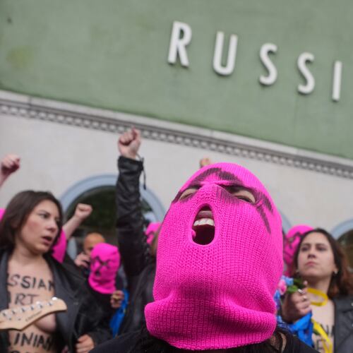 FILE - Pussy Riot and FEMEN activists protest Russia's presence after its absence following the 2022 invasion of Ukraine in front of the Russian pavilion at the 2026 Art Venice Biennale in Venice, Italy, May 6, 2026. (AP Photo/Luca Bruno, File)