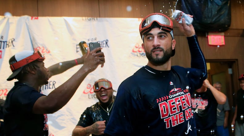 Nick Markakis celebrates after the Braves clinched the division title. (Photo by Daniel Shirey/Getty Images)