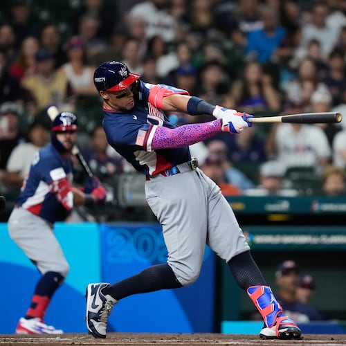 United States' Aaron Judge (99) hits a two-run home run during the first inning of a World Baseball Classic game against Brazil, Friday, March 6, 2026, in Houston. (AP Photo/Ashley Landis)