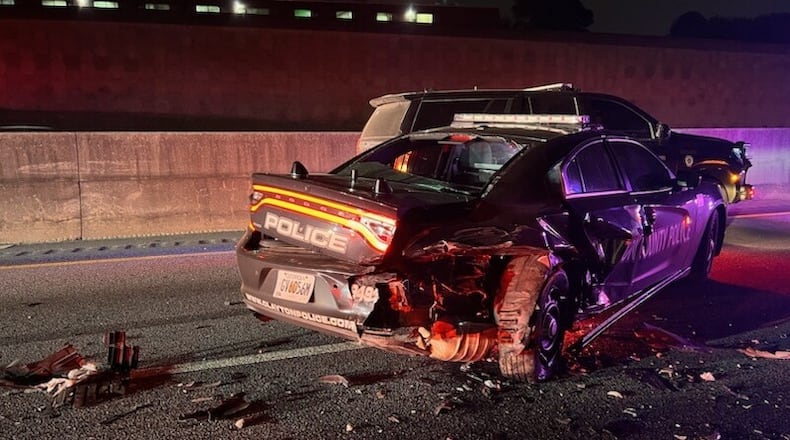 No police officers were injured when a driver slammed into a Clayton County patrol car early Thursday.