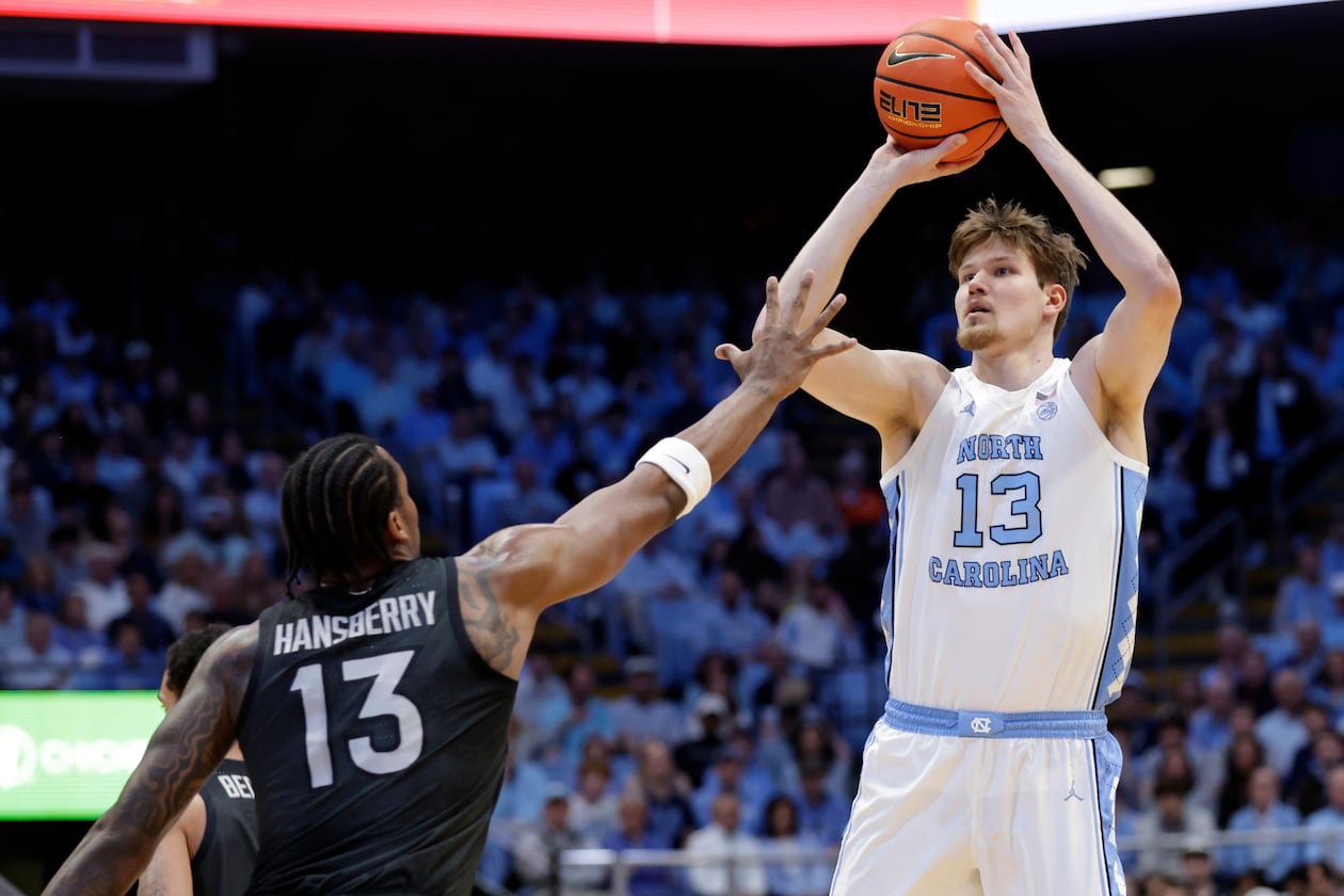 North Carolina center Henri Veesaar (13) shoots as Virginia Tech forward Amani Hansberry (13) defends during the first half of an NCAA college basketball game Saturday, Feb. 28, 2026, in Chapel Hill, N.C. (Chris Seward/AP)