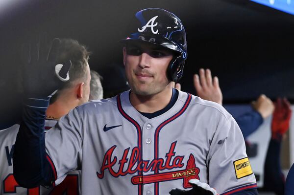 Braves third baseman Austin Riley celebrates his fifth-inning three-run homer.