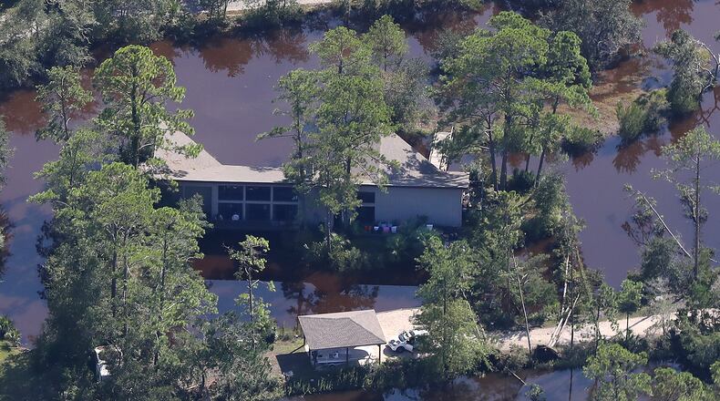 September 12, 2017 St. Simons Island: A home on St. Simons Island is surrounded by water following Hurricane Irma on Tuesday, September 12, 2017, on the Georgia coast. Curtis Compton/ccompton@ajc.com