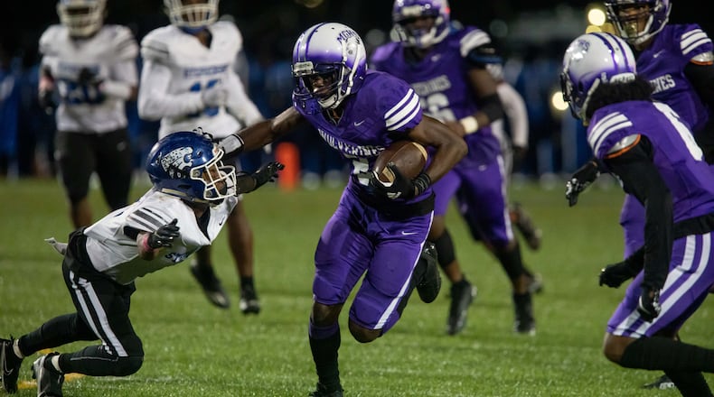 Miller Grove's Cayman Spalding carries the ball for a touchdown during a GHSA high school football game between Stephenson High School and Miller Grove High School at James R. Hallford Stadium in Clarkston, GA., on Friday, Oct. 8, 2021. (Photo/Jenn Finch)