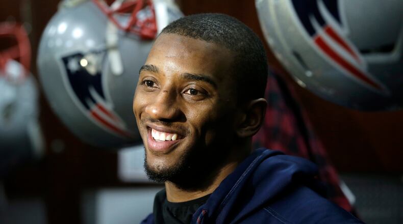 New England Patriots wide receiver Malcolm Mitchell speaks with members of the media in the team's locker room following an NFL football team practice, Thursday, Jan. 26, 2017, in Foxborough, Mass. The Patriots are to play the Atlanta Falcons in Super Bowl LI, Feb. 5, 2017, in Houston. (AP Photo/Steven Senne)
