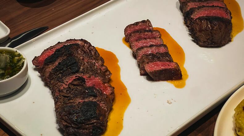 The steak tasting for two at Bask Steakhouse includes a 3-ounce wagyu strip (center). Henri Hollis/henri.hollis@ajc.com