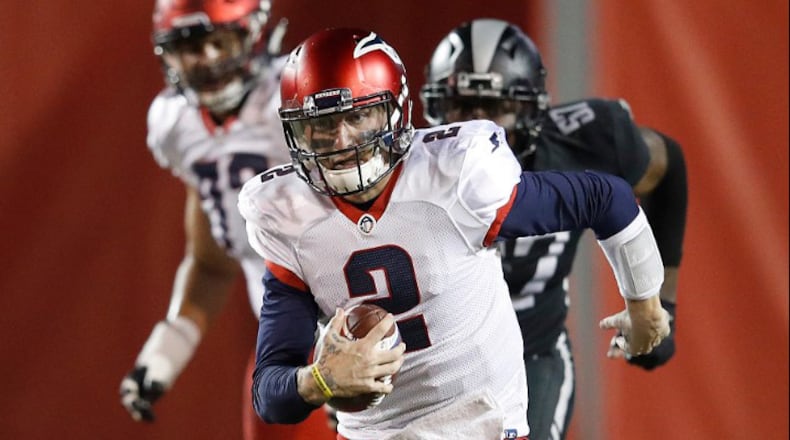 Memphis Express quarterback Johnny Manziel runs the ball as they play the Birmingham Iron Sunday March 25, 2019, at Liberty Bowl Memorial Stadium in Memphis