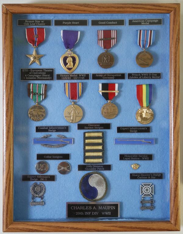 Charles Maupin received many metals during his service in the U.S. military, including the Purple Heart and a Bronze Star with an oak leaf cluster. BOB ANDRES / BANDRES@AJC.COM