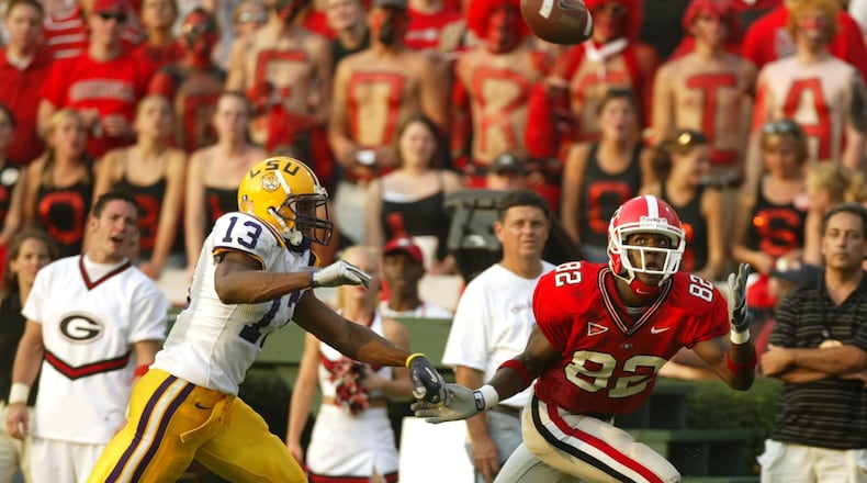 Georgia’s Fred Gibson beats LSU defender Corey Webster for a catch in a 2004 game in Athens. (BRANT SANDERLIN/AJC staff)