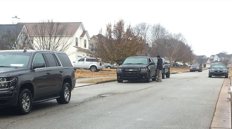 A double shooting early Sunday morning in Locust Grove left one man dead and another critically hurt, police said. (Credit: Channel 2 Action News)