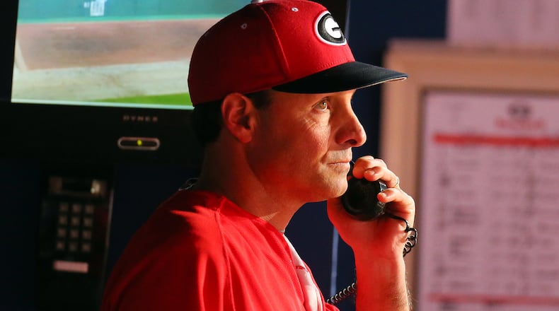 Georgia head coach David Perno makes a call to the bullpen during late inning action against Georgia Tech in the 11th Annual Kauffman Tire Spring Classic for Kids college baseball game on Tuesday, April 23, 2013, in Atlanta.