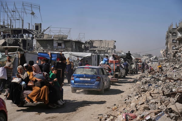 Displaced Palestinians fleeing Beit Lahia amid ongoing Israeli military operations in the Gaza Strip arrive in Jabalia, northern Gaza, on Friday, May 16, 2025. (AP Photo/Jehad Alshrafi)