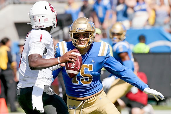 UCLA defensive end Laiatu Latu (15) during the 2023 Rose Bowl. 