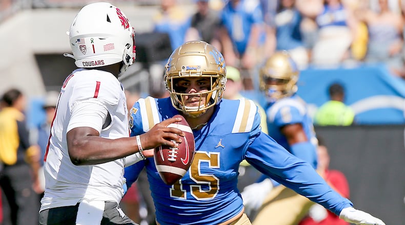 UCLA defensive end Laiatu Latu (15) pressures the quarterback against Washington State at the Rose Bowl on Oct. 7, 2023, in Pasadena, California. (Luis Sinco/Los Angeles Times/TNS)