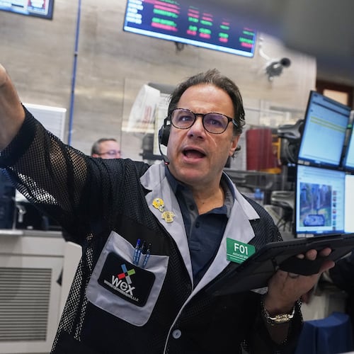 Options trader Anthony Spina works on the floor of the New York Stock Exchange, Wednesday, Nov. 12, 2025. (AP Photo/Richard Drew)