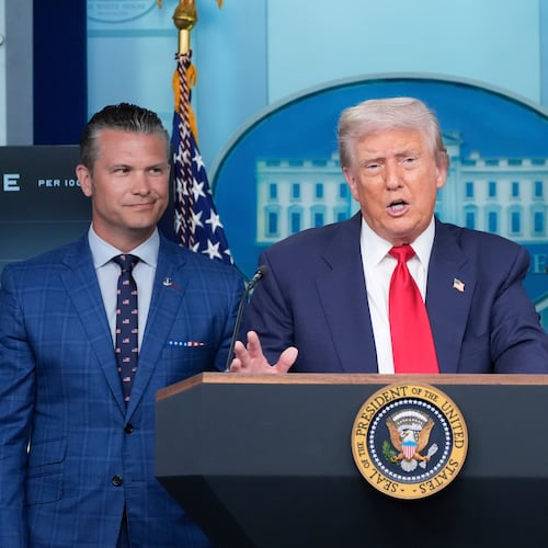 President Donald Trump speaks with reporters in the James Brady Press Briefing Room at the White House, Monday, Aug. 11, 2025, in Washington, as Secretary of Defense Pete Hegseth and Attorney General Pam Bondi look on. (Alex Brandon/AP)