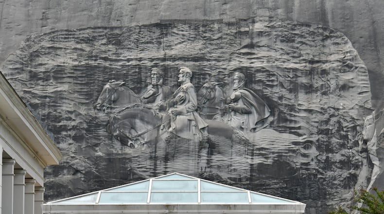 April 20, 2021 Stone Mountain - Memorial Hall (foreground) and Confederate Memorial Carving (background) at Stone Mountain Park on Tuesday, April 20, 2021. (Hyosub Shin / Hyosub.Shin@ajc.com)