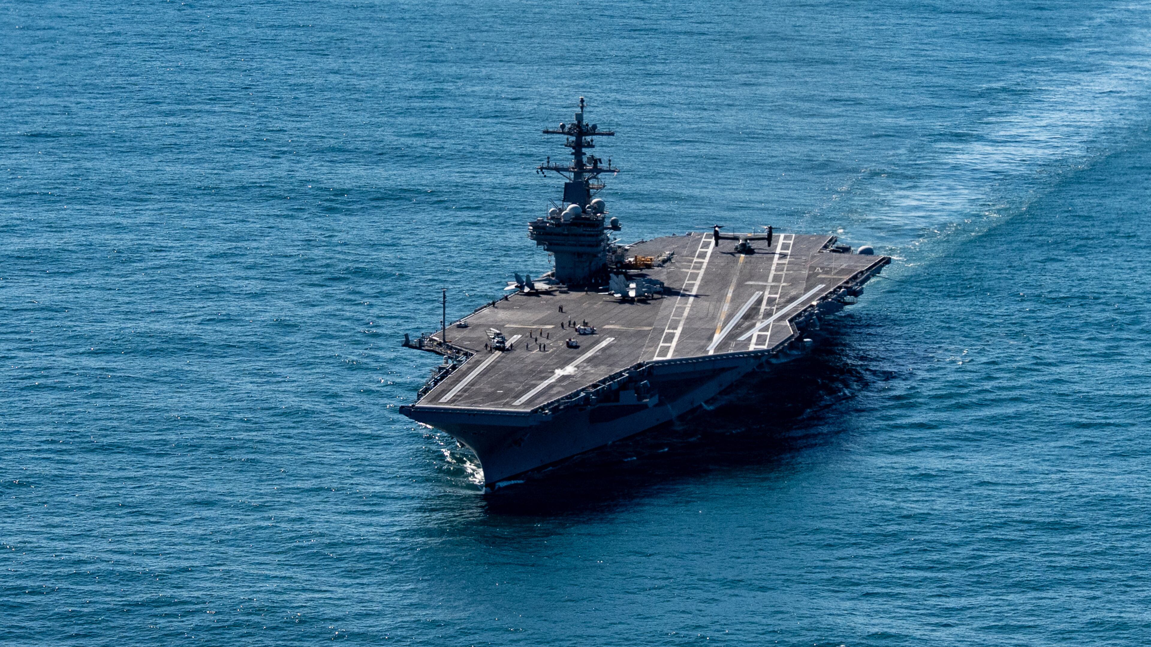 The USS George H.W. Bush aircraft carrier sails in the Atlantic Ocean off the coast of Norfolk, Va., Saturday, Oct. 4, 2025. (AP Photo/Alex Brandon, Pool)