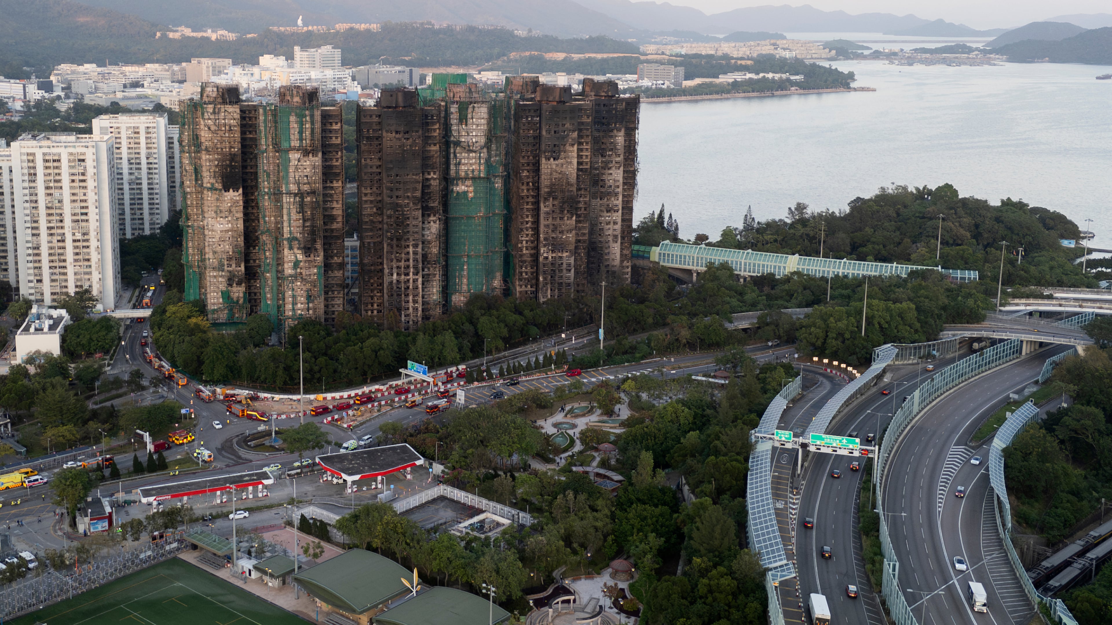 An aerial view of the burnt buildings after a deadly fire that started Wednesday at Wang Fuk Court, a residential estate in the Tai Po district of Hong Kong's New Territories, Friday, Nov. 28, 2025. (AP Photo/Ng Han Guan)