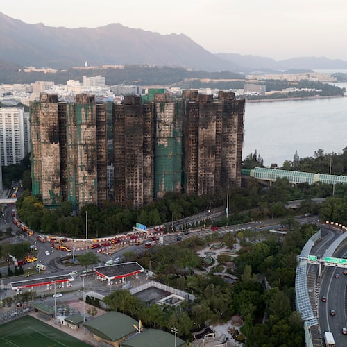 An aerial view of the burnt buildings after a deadly fire that started Wednesday at Wang Fuk Court, a residential estate in the Tai Po district of Hong Kong's New Territories, Friday, Nov. 28, 2025. (AP Photo/Ng Han Guan)