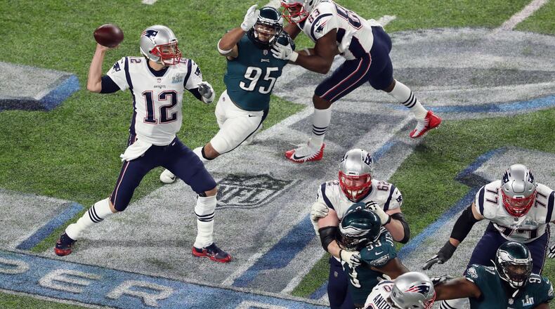 MINNEAPOLIS, MN - FEBRUARY 04: Tom Brady #12 of the New England Patriots attempts a pass in the third quarter of Super Bowl LII against the Philadelphia Eagles at U.S. Bank Stadium on February 4, 2018 in Minneapolis, Minnesota. (Photo by Christian Petersen/Getty Images)