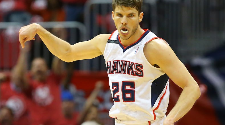 050114 ATLANTA: Hawks Kyle Korver reacts to hitting a three pointer against the Pacers during the first half of their First Round Game 6 contest on Thursday, May 1, 2014, in Atlanta. CURTIS COMPTON / CCOMPTON@AJC.COM