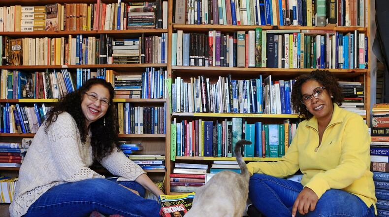 Susan Smelser (left), current owner of The Book Worm, and Julia Davis (right), a children’s book author, pose for a portrait at The Book Worm on Friday, April 3, 2020, in Powder Springs, Georgia. Davis is looking to purchase The Book Worm from Smelser. (Christina Matacotta, for The Atlanta Journal-Constitution)