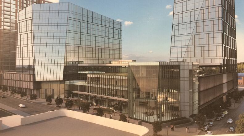 This rendering shows the two phases of Spring and 8th Street, the headquarters campus of NCR. The first tower, a 20-story office building to the right, is under construction. The smaller tower to the left is being designed as NCR’s second phase. Source: Cousins Properties, NCR, Duda Paine Architects, HKS and Kimley-Horn
