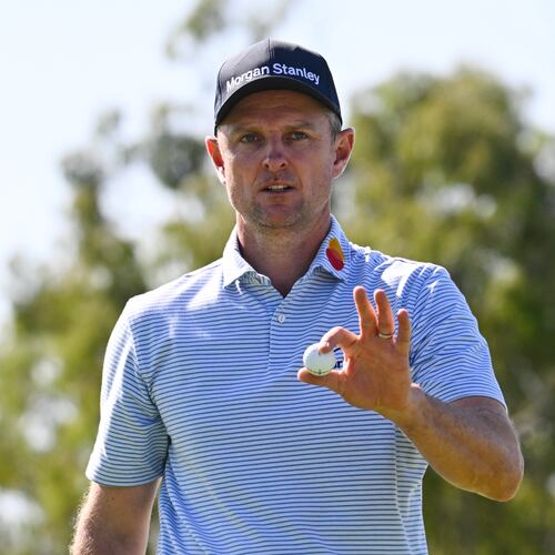 Justin Rose, of England, acknowledges the gallery after making a putt on the sixth green of the South Course at Torrey Pines during the third round of the Farmers Insurance Open golf tournament Saturday, Jan. 31, 2026, in San Diego. (AP Photo/Denis Poroy)