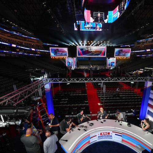 Production members test a stage on Tuesday ahead of the Republican midterm convention in Dallas, Texas. (Julio Cortez/AP)