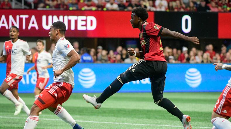 Atlanta United's George Bello follows through on a goal scoring kick against the New England Revolution during the first half of an MLS soccer game, Saturday, Oct. 6, 2018. (John Amis)