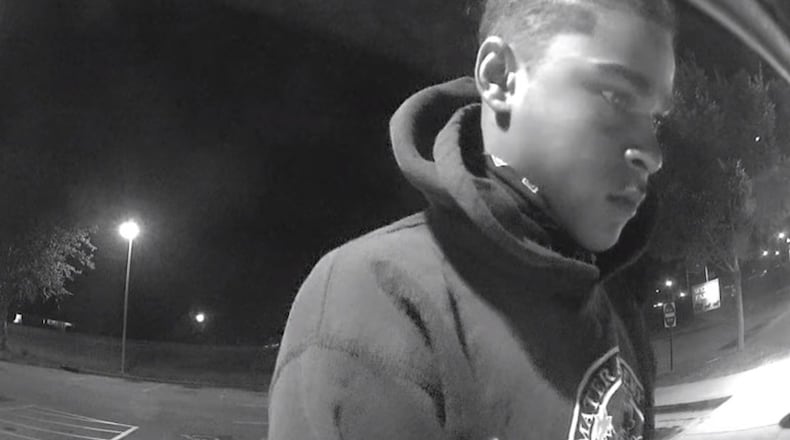 Police released this surveillance video two days before officers arrested four suspects accused of an armed robbery in Covington.