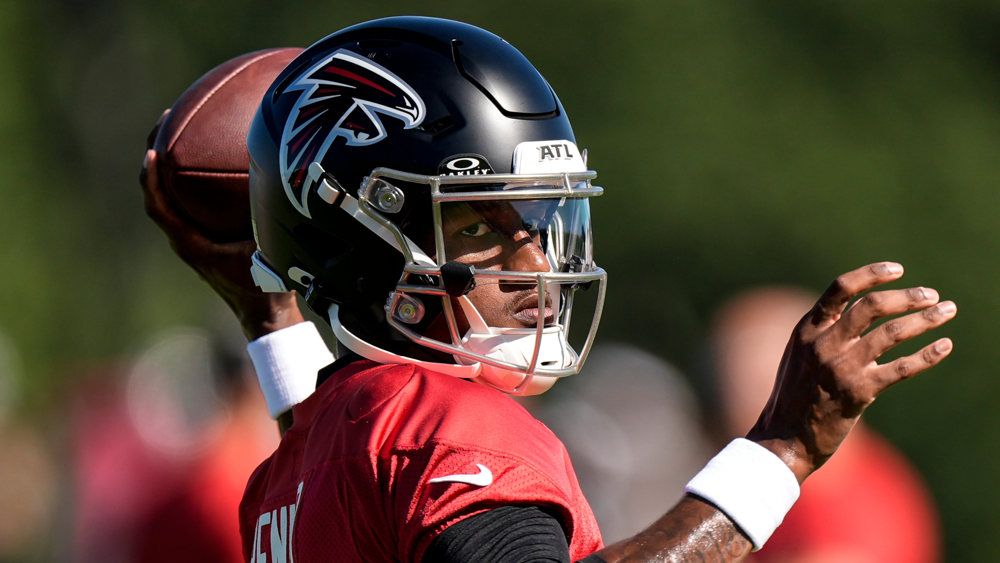 Atlanta Falcons quarterback Michael Penix Jr. (9) works out during a Atlanta Falcons training camp, Saturday, July 26, 2025, in Flowery Branch. (AP Photo/Mike Stewart)
