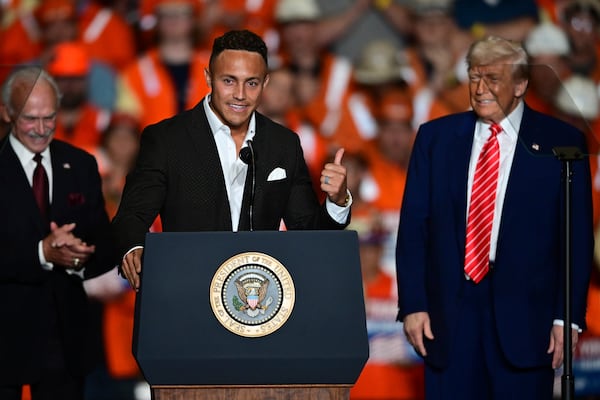 Pittsburgh Steelers Miles Killebrew speaks as former Pittsburgh Steelers Rocky Bleier, and President Donald Trump listen at the U.S. Steel Mon Valley Works-Irvin plant, Friday, May 30, 2025, in West Mifflin, Pa. (AP Photo/David Dermer)