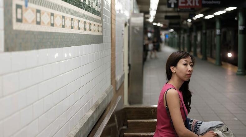 Wages among Asian people and Pacific Islanders are concentrated on both ends of the pay spectrum: Some groups make only half of a White man's average annual income, while others exceed it. (Getty Images)