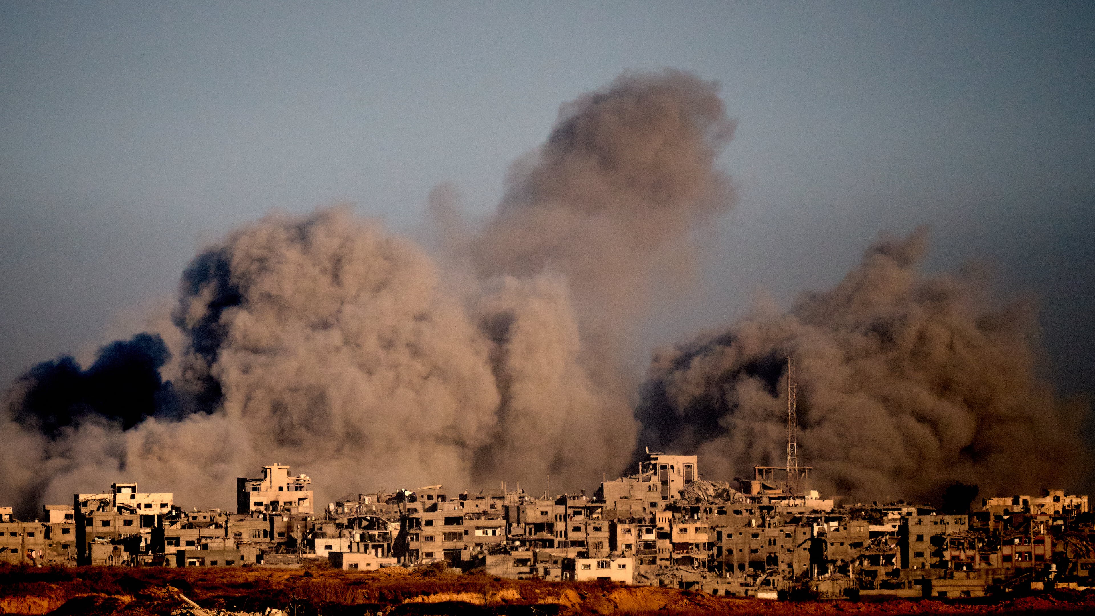 Smoke rises to the sky following an Israeli military strike in the northern Gaza Strip, as seen from southern Israel, Wednesday, Oct. 8, 2025. (AP Photo/Emilio Morenatti)