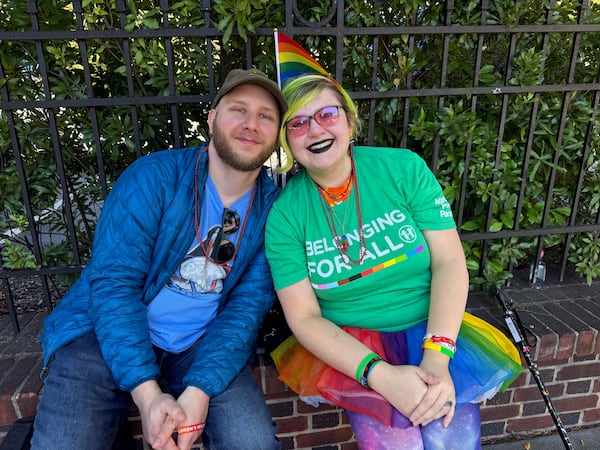 Tiffany Marie Bradley (right), 38, from Brookhaven was at the parade with their husband,  Nick. (Danielle Charbonneau/AJC)
