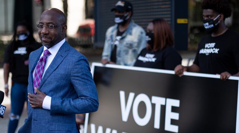201021-Atlanta- Rev. Raphael Warnock holds a press conference before voting Wednesday morning, October 21, 2020 at State Farm Arena in downtown Atlanta. Ben Gray for the Atlanta Journal-Constitution