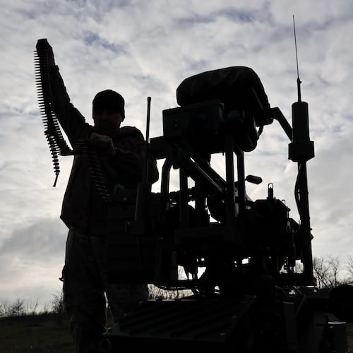 In this photo, provided by Ukraine's 65th Mechanized Brigade press service, a soldier tests land drones in Zaporizhzhia region, Ukraine, Saturday, Dec. 6, 2025, (Andriy Andriyenko/Ukraine's 65th Mechanized Brigade via AP)
