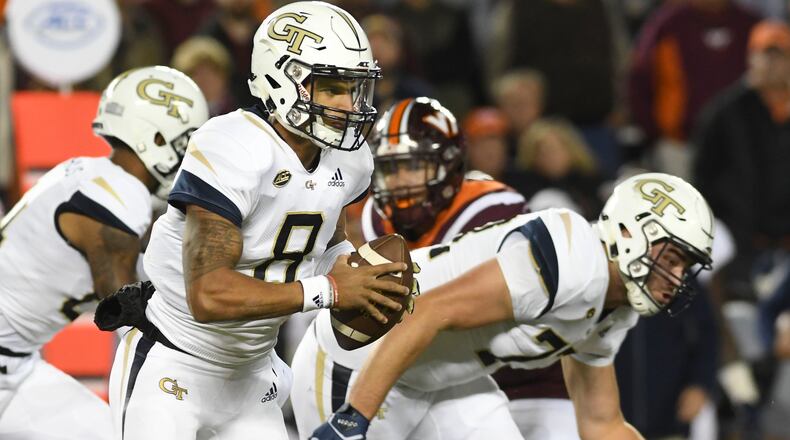 Quarterback Tobias Oliver looks for yardage in last month's game against Virginia Tech. (Photo by Michael Shroyer/Getty Images)