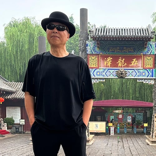 In this photo taken June 2023 and released by Zhao Yaliang, Chinese artist Gao Zhen poses for a photo in Jinan in northern China's Shandong province. (Zhao Yaliang via AP)