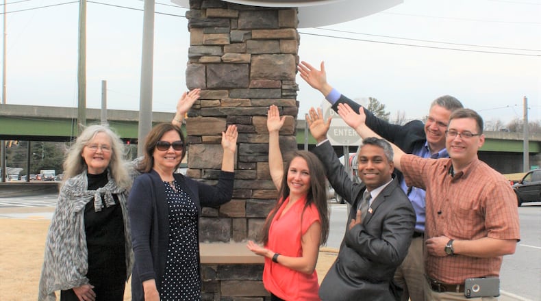 Left to right: Councilman Pam Fleming, Mayor Donna Pittman, Councilman Shannon Hillard, Councilman Md Naser, City Manager Shawn Gillen and Councilman Robert Patrick pose next to the main city entrance sign.